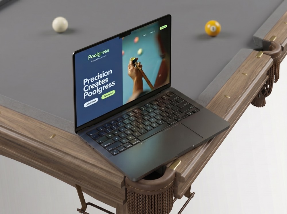 Poolgress website displayed beside a pool table