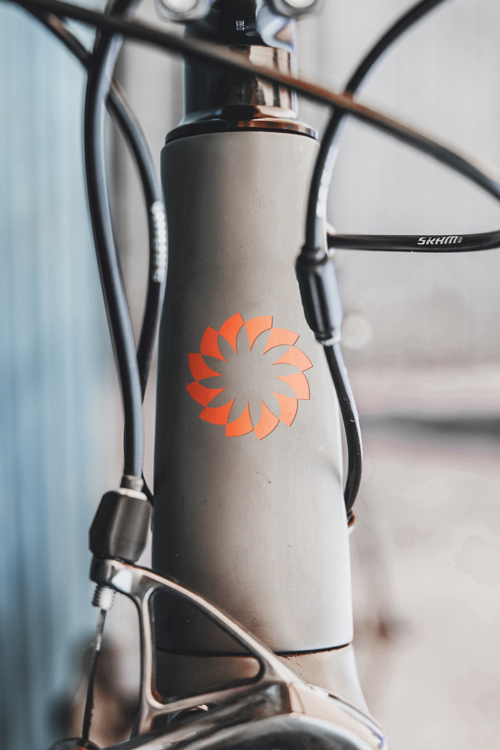 Conceptual Arium logo applied to the front of a bicycle frame