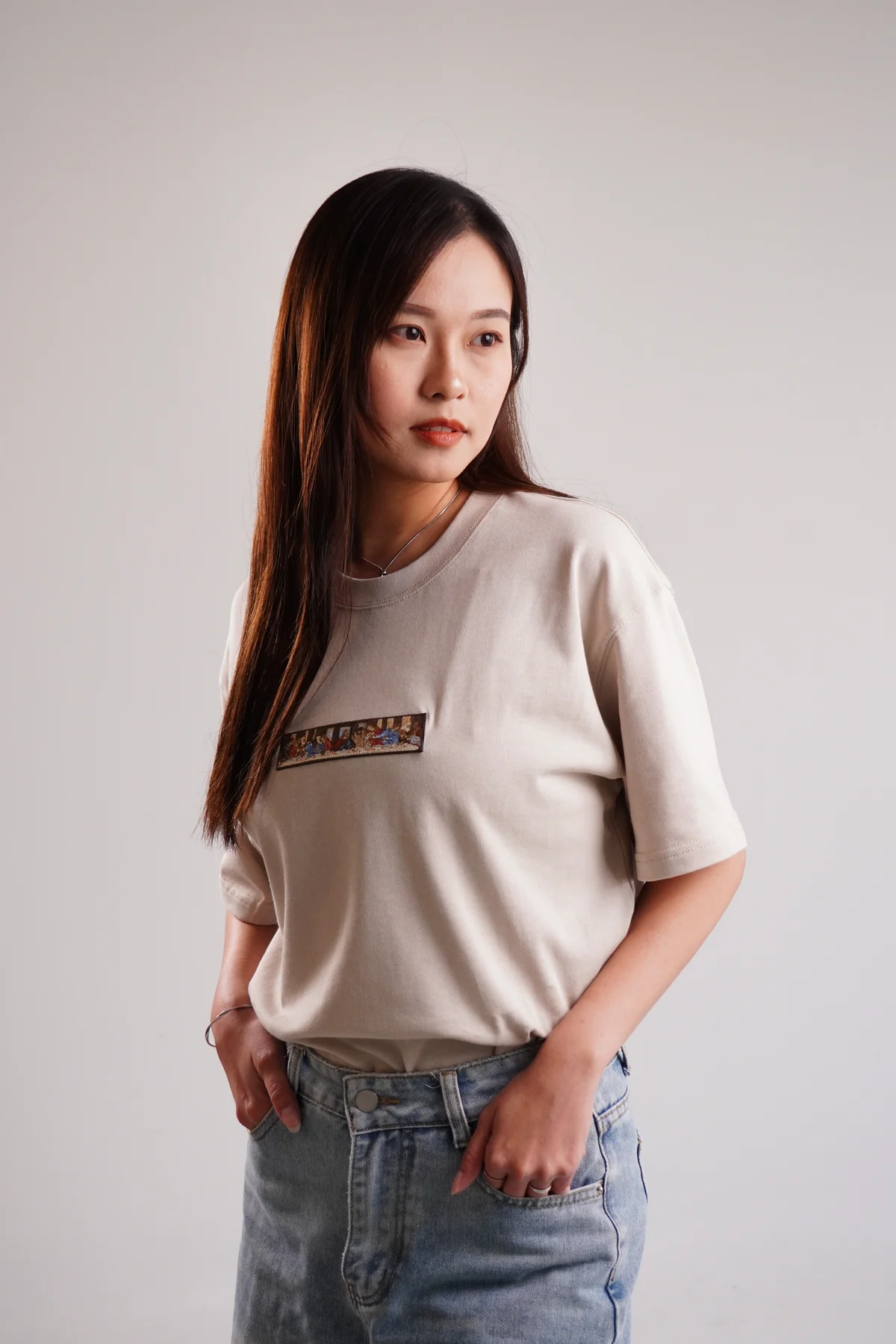 Model wearing an EMJOUR campaign outfit